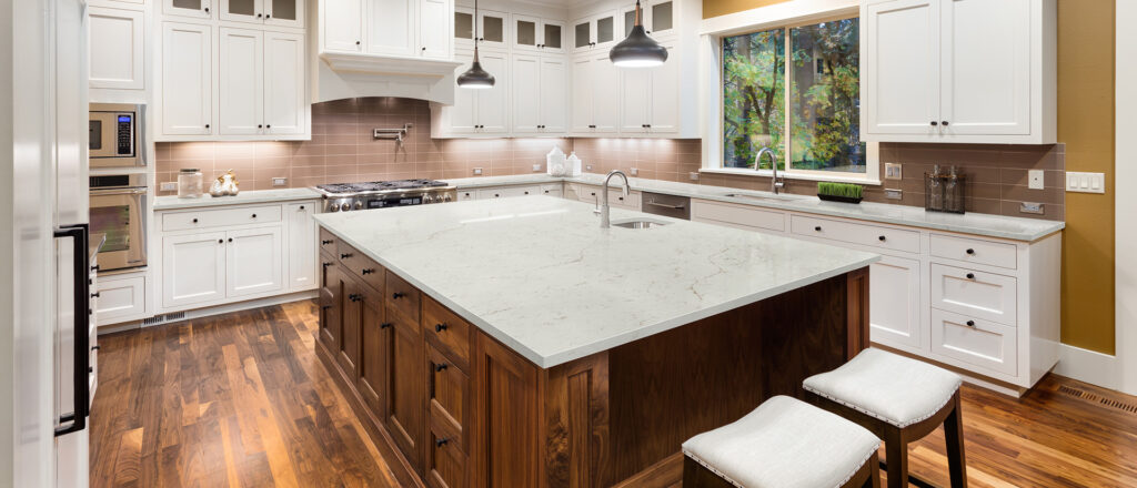 Old wood looking kitchen cabinets with modern quartz countertops